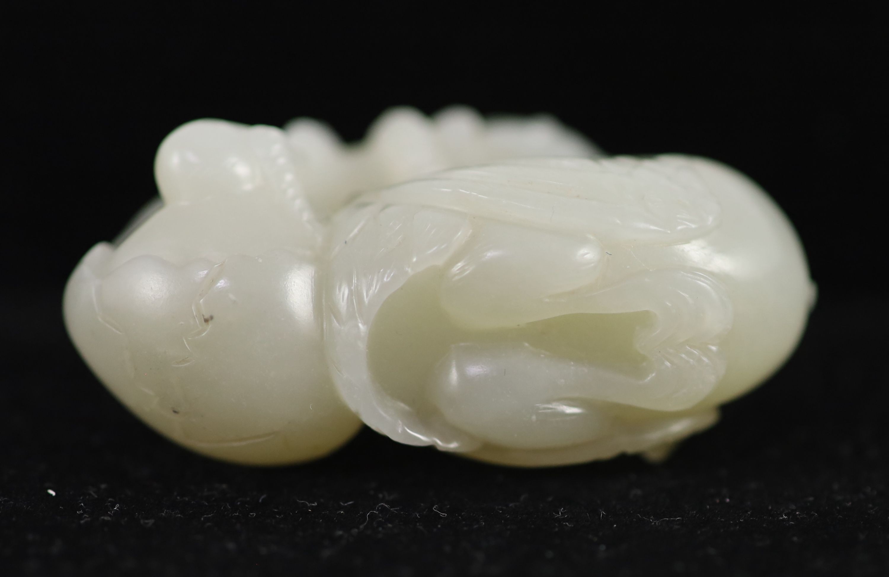 A Chinese pale celadon jade ‘ducks and millet’ group 5.7 cm